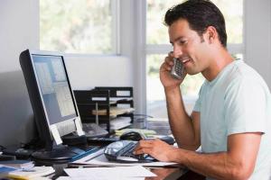 Man prospecting from home office